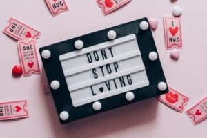 Cute funny and short love messages written on a heart-shaped note
