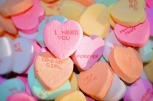 Cute funny and short love messages written on a heart-shaped note